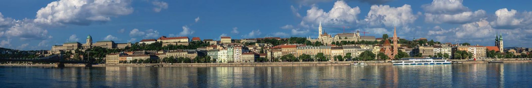 Budapest, Hungary 18.08.2021. Panoramic view of the Danube river and the embankment of Buda on a sunny summer morning