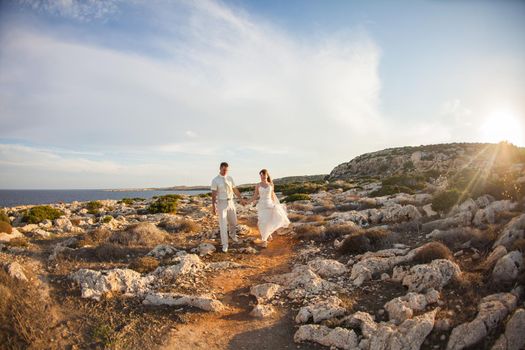 Bride and groom on their wedding day on nature