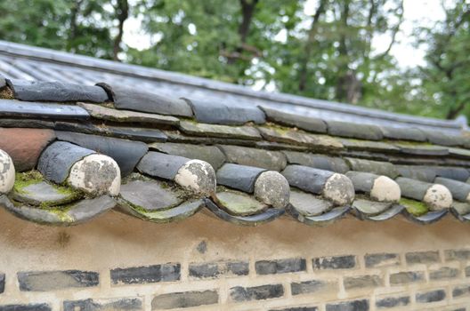 korean Traditional tile of roof and korea old house wall.