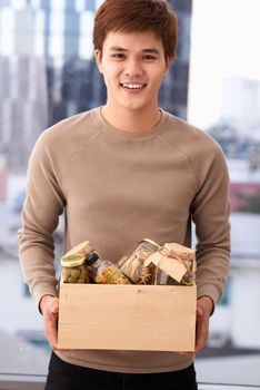 Donation cardboard box with various food. Grocery food delivery during pandemic, online shopping or donation concept