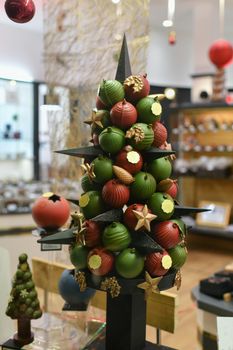 Chocolate tree in a showcase pastry shop