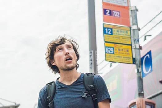 A man lost in Hong Kong. Buses in hong kong.