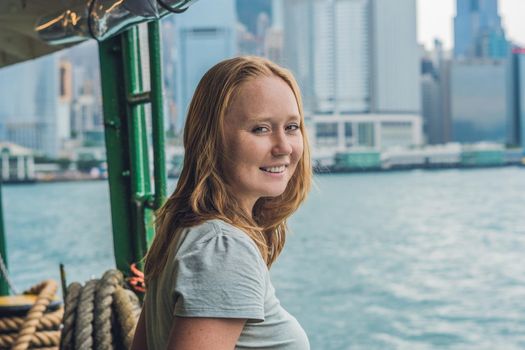 Young woman on a ferry in Hong Kong.