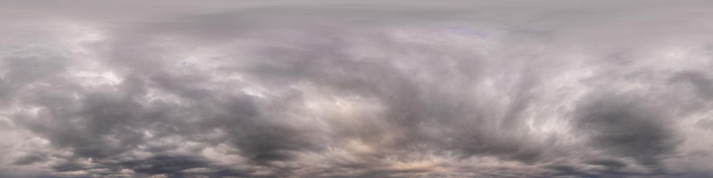 Overcast sky panorama on sunset with Cumulus clouds in Seamless spherical equirectangular format as full zenith for use in 3D graphics, game and aerial drone 360 degree panoramas for sky replacement