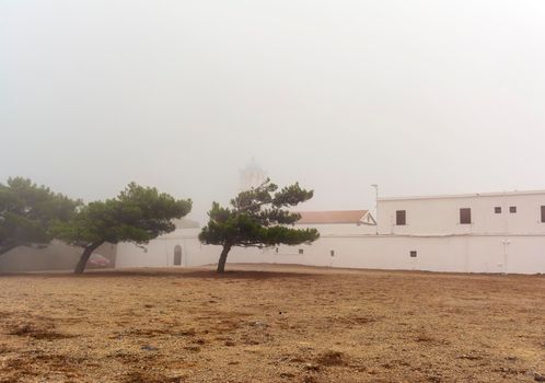 View of the famous old monastery of Agia Elesa in fog. Kythira island in Greece.