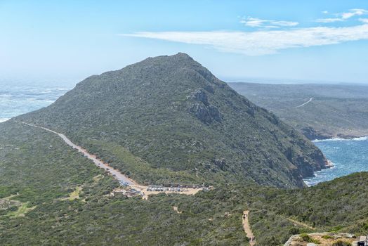 The parking area as seen from Cape Point. Vehicles and people are visible