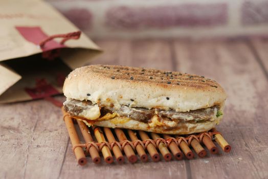 Club sandwich and French fries with ketchup sauce on wooden table. High quality photo