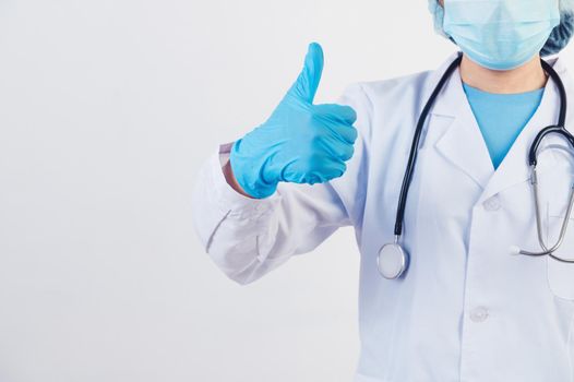 Closeup professional doctors give big thumbs up gesture on white background to patients who treated at hospital or clinic to assure will get well soon. Medical personnel and health people concept.