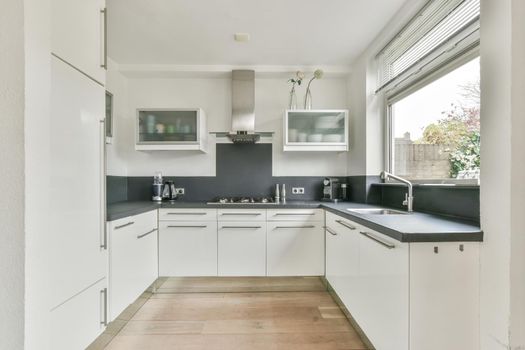 Cozy kitchen zone with in a spacious apartment
