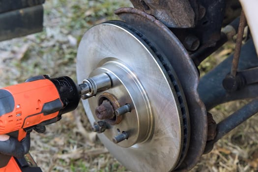 Car repair wheel hub of an old car brake pad, wheel axle, mounting bolts