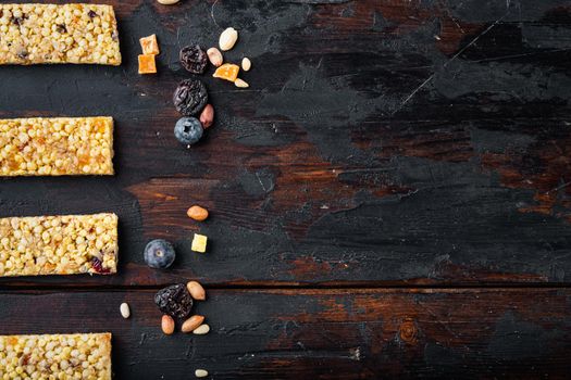 Fruit berry, nut energy bars. Healthy snack, top view with copy space, on wooden table