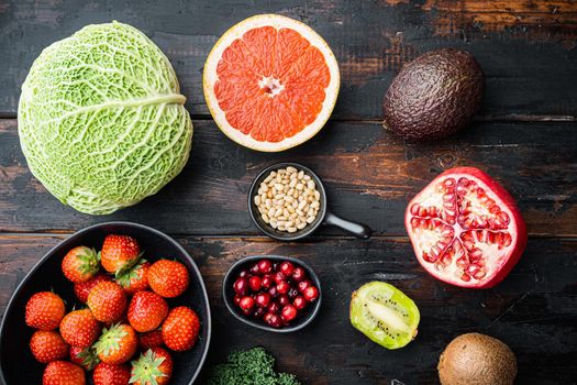 Healthy food, diet concept, top view on dark wooden background.