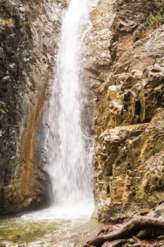 Autumn landscape with a waterfall in Troodos, Cyprus.