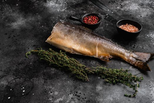 Fresh smoked salmon set, on black dark stone table background
