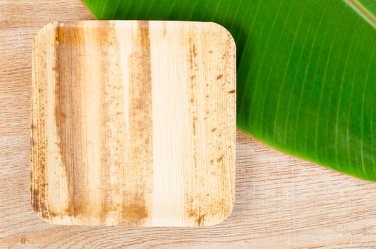 Kitchenware made from dried betel nut leaf palm, natural material. The Green product eco friendly concept.