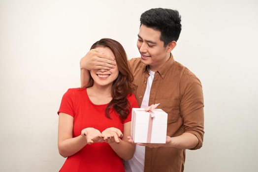 Couple in valentine day holding gift box
