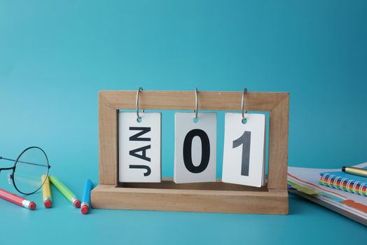 wooden calendar set on 1st of january ,