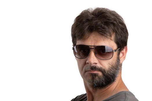 split personality - portrait of ordinary forty - 40 years old bearded man with half shaved and unshaven face with sunglasses isolated on white