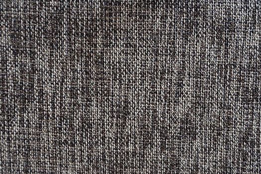 Gray canvas fabric for natural textile background close-up