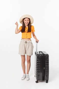 Woman tourist. Full length happy young woman standing with suitcase with exciting gesturing, isolated on white background