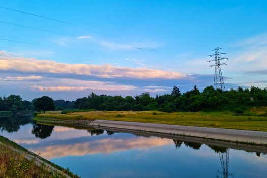 View of the electric lines on the river bank