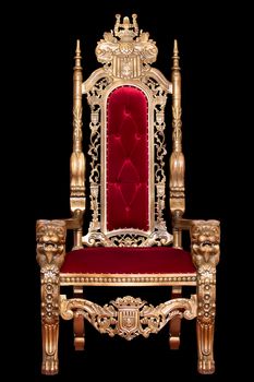 Red royal chair isolated on black background. Place for the king. Throne. Tsar's chair.