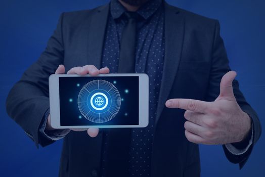 Man holding Screen Of Mobile Phone Showing The Futuristic Technology.