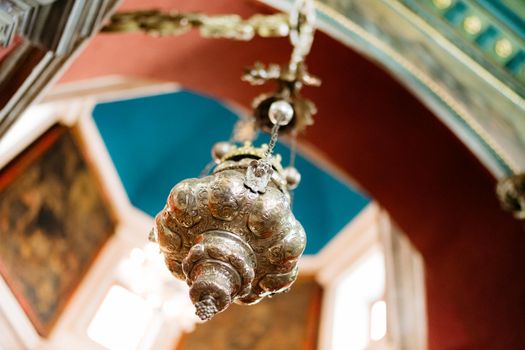 Censer hangs from a chain in the Church of Our Lady of the Rocks. High quality photo