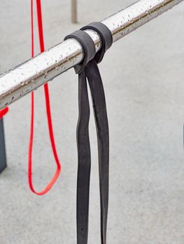 Colorful elastic band ready on workout gym place. Detail shot of resistance bands.  Outdoor fitness