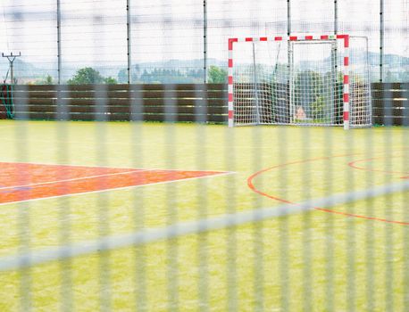 Frame and net of a soccer goal. Soccer or football goal net.  Outdoor training playfield