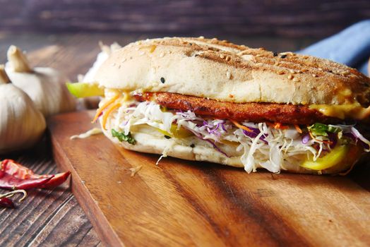 Club sandwich and French fries with ketchup sauce on wooden table. High quality photo