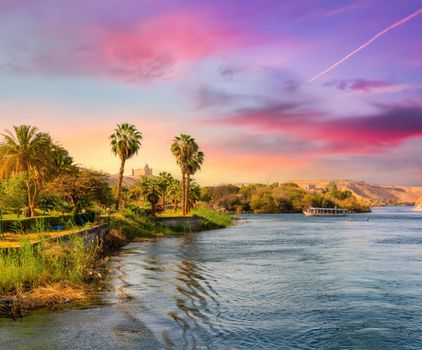 Travel on sailboat by picturesque river Nile in Aswan