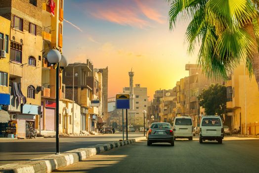 Road and street of Luxor town at sunset