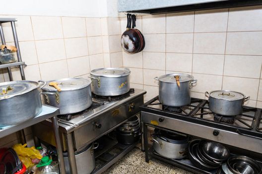 Typical kitchen of a restaurant shot in operation, Typical kitchen of a restaurant shot in operation, homemade kitchen