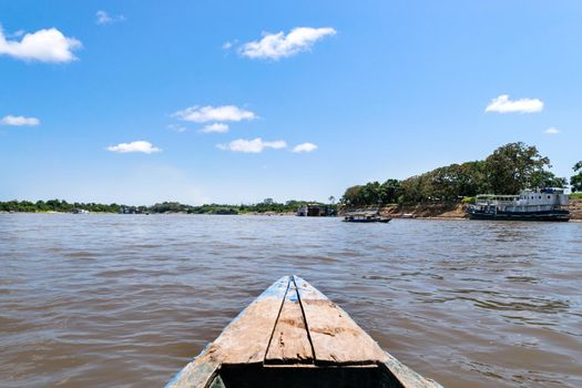 Beautiful view over the waters of the Amazon River in a boat in Iquitos - Peru