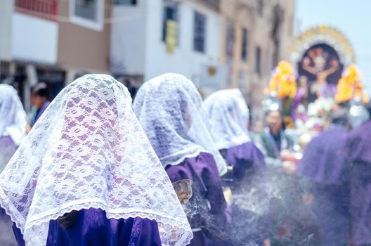 Female incense burners following the procession of the Lord of Miracles every October in Lima - Peru