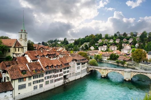 View of the river Aar as it flows through the medieval city of Bern. A UNESCO World Heritage Site.
