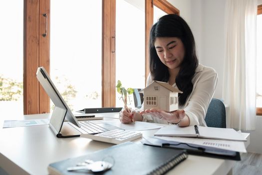 Real estate agent working for house insurance or loan real estate. rent a house,get insurance or loan real estate or property