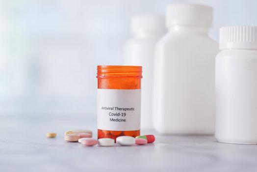 covid 19 medical pills medical pill container on table .