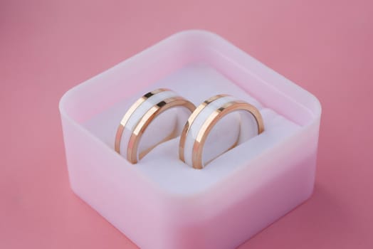 close up wedding ring in a box on r table .