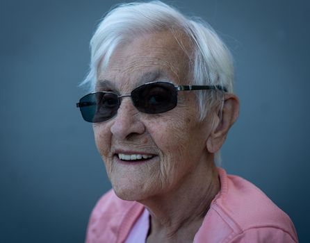 Aged candid woman close up portrait , high photo