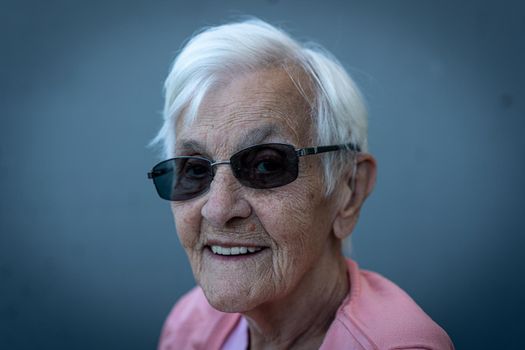 Aged candid woman close up portrait , high photo