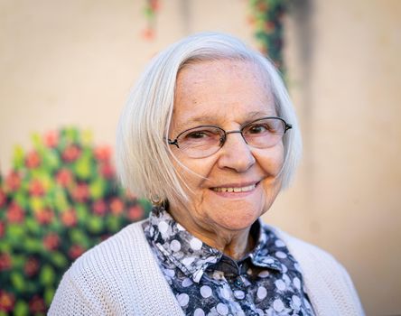 Aged candid woman close up portrait , high photo