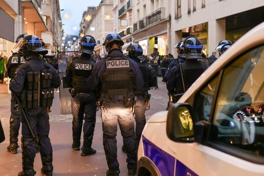 Policemen in the town on strike in a crowd of people