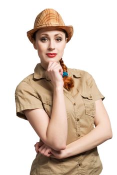 Pretty teenager girl in shots shirt and hat on white background