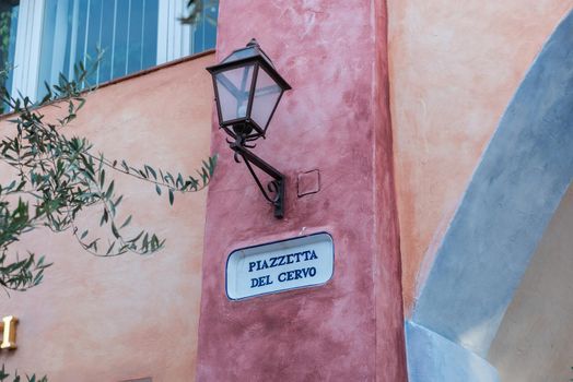 Street sign of Piazzetta del Cervo, one of the main squares in Porto Cervo, Sardinia, Italy. The town is the iconic centre of Costa Smeralda