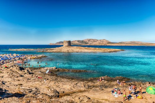 Scenic view of La Pelosa beach, one of the most beautiful seaside places of the Mediterranean, located in the town of Stintino, northern Sardinia, Italy