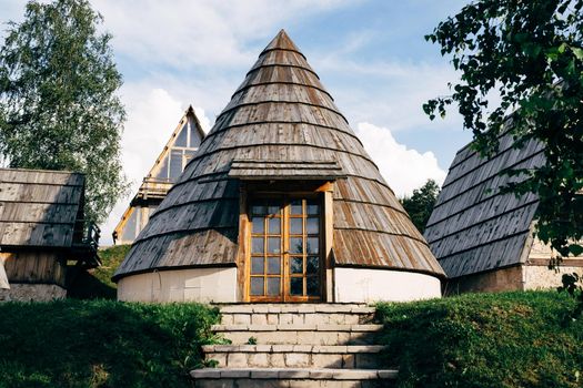 Stone steps to a conical house in the north of Montenegro. High quality photo