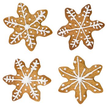 Gingerbread cookie in snowflake shape isolated on white background.