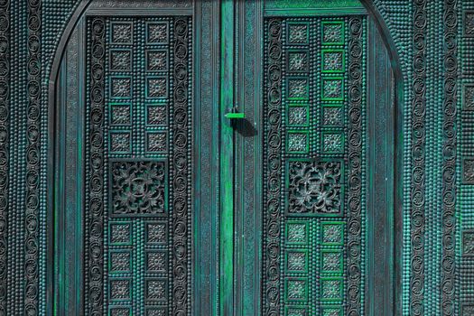 Beautiful wood carving, handmade door in muslim oriental style. Exploring arabic countries.